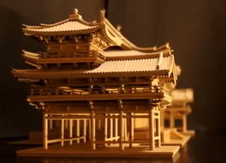 Illustration for article titled Amazon Cardboard Boxes Make a Beautiful Buddhist Temple